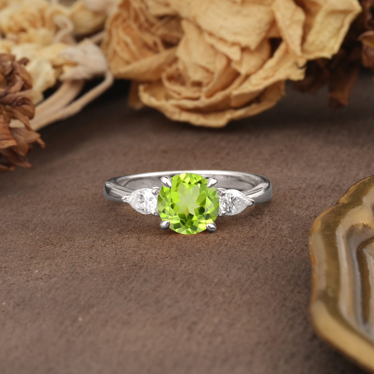 Classic, Luxurious 4-Prong Pear Cut Peridot Three Stone Engagement Ring - Additional view