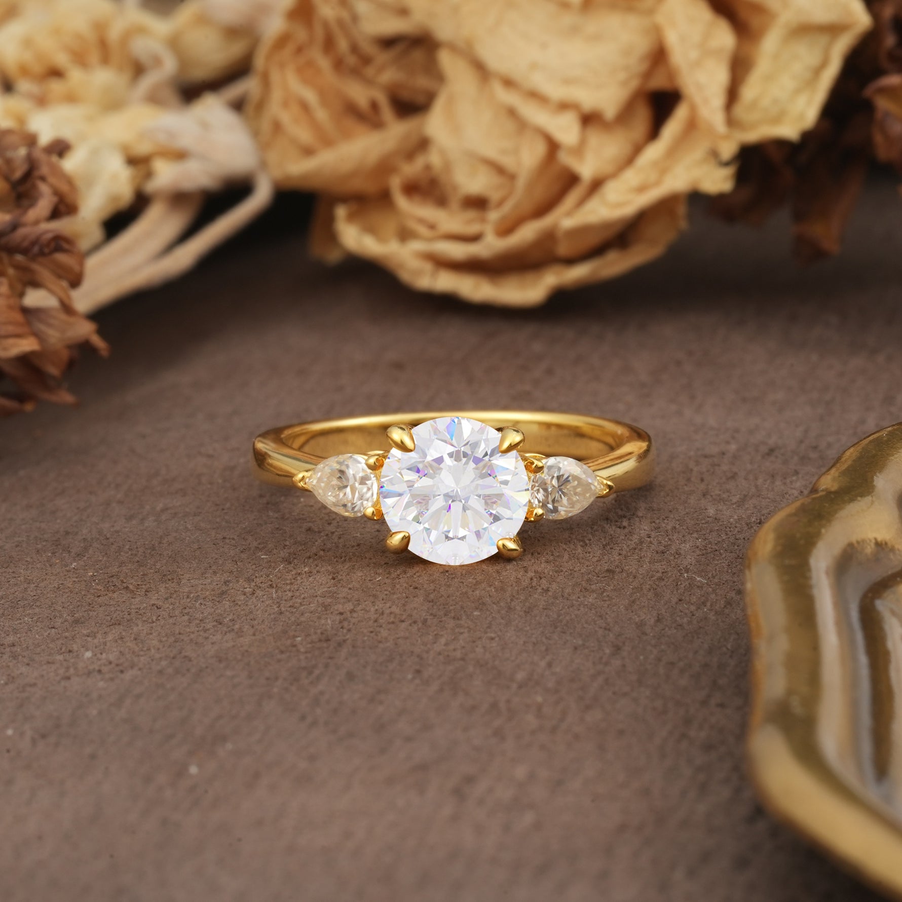 Classic, Luxurious 4-Prong Pear Cut Moissanite Three Stone Engagement Ring - Additional view