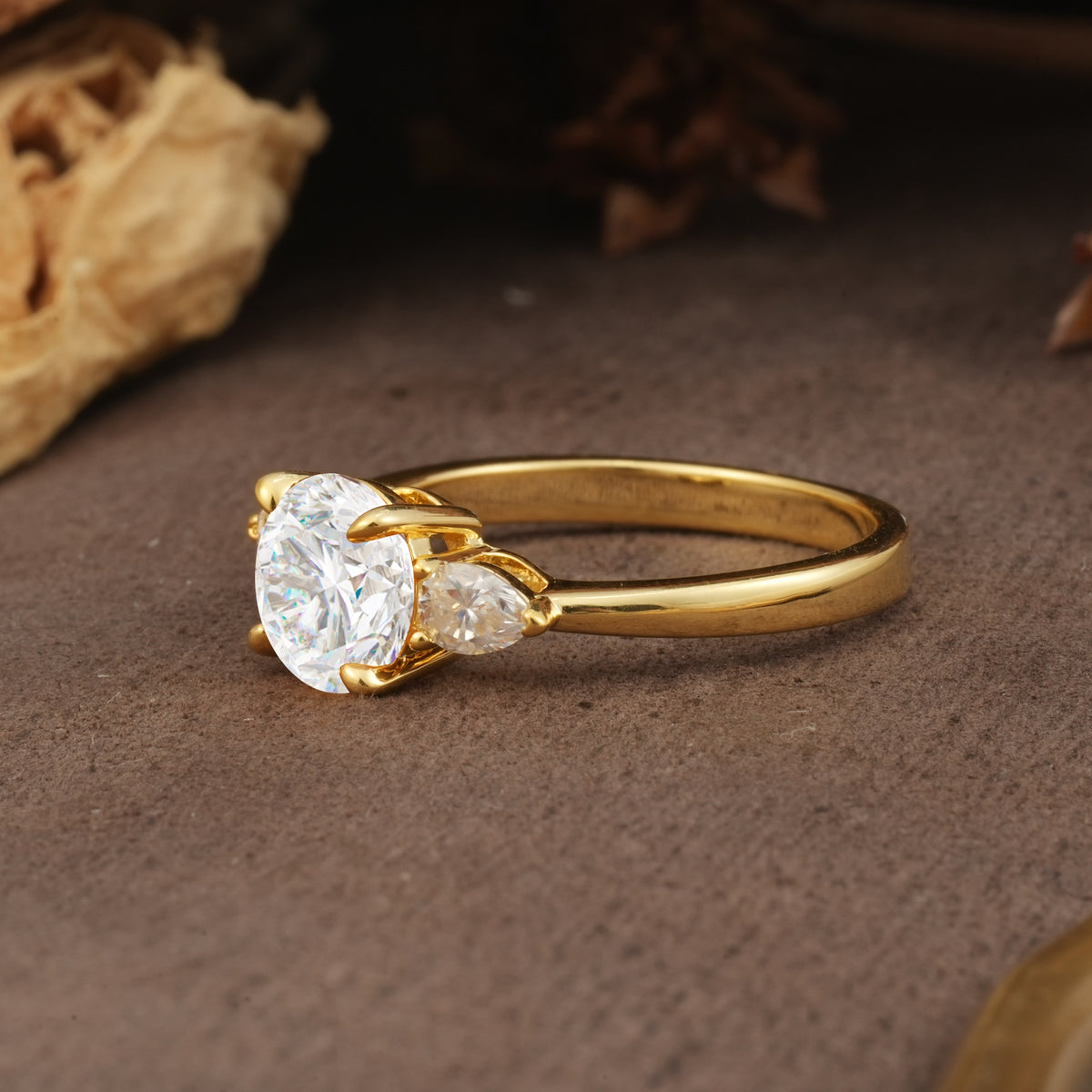 Classic, Luxurious 4-Prong Pear Cut Moissanite Three Stone Engagement Ring - Additional view