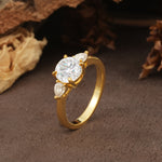 Classic, Luxurious 4-Prong Pear Cut Moissanite Three Stone Engagement Ring - Additional view