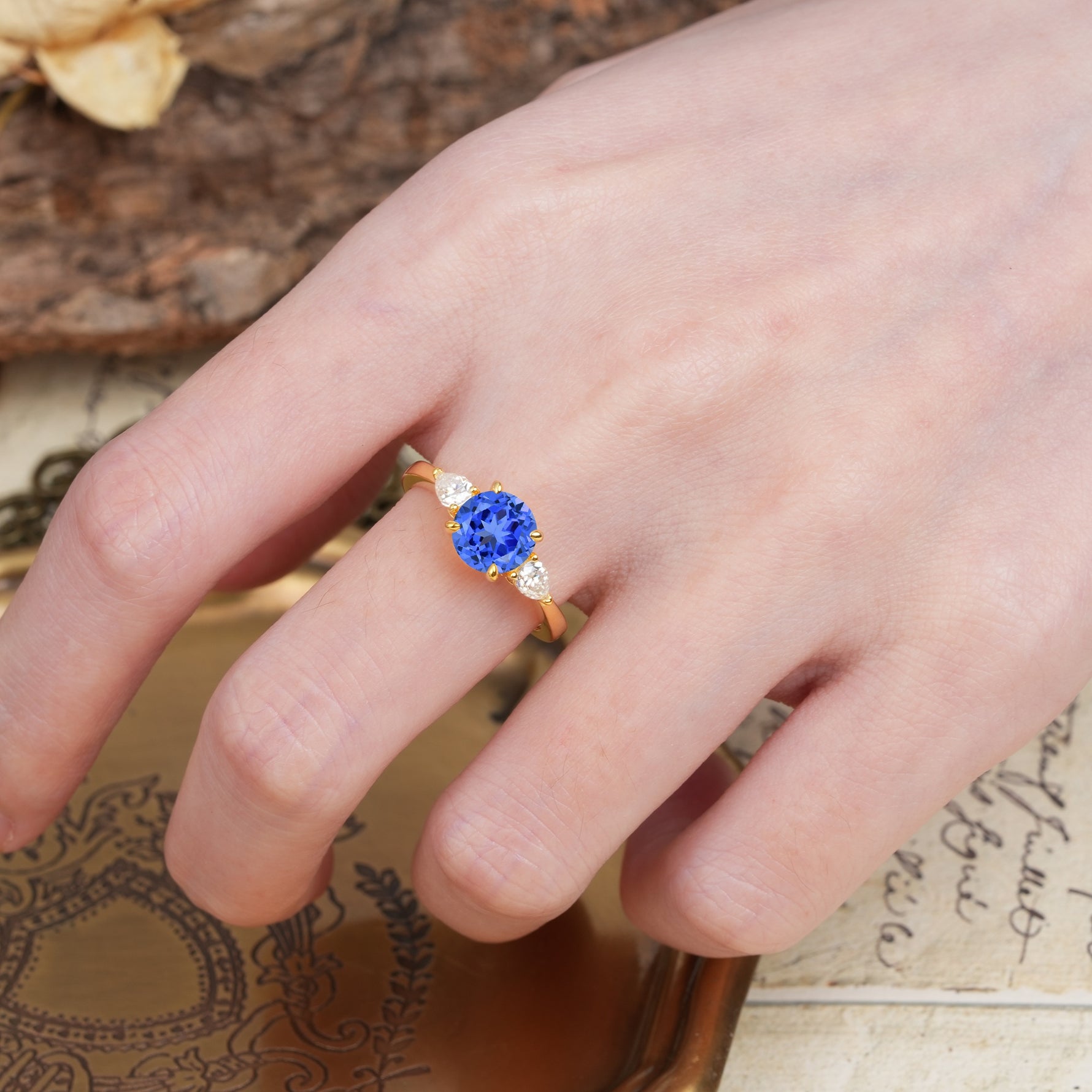 Classic, Luxurious 4-Prong Pear Cut Sapphire Three Stone Engagement Ring - Additional view