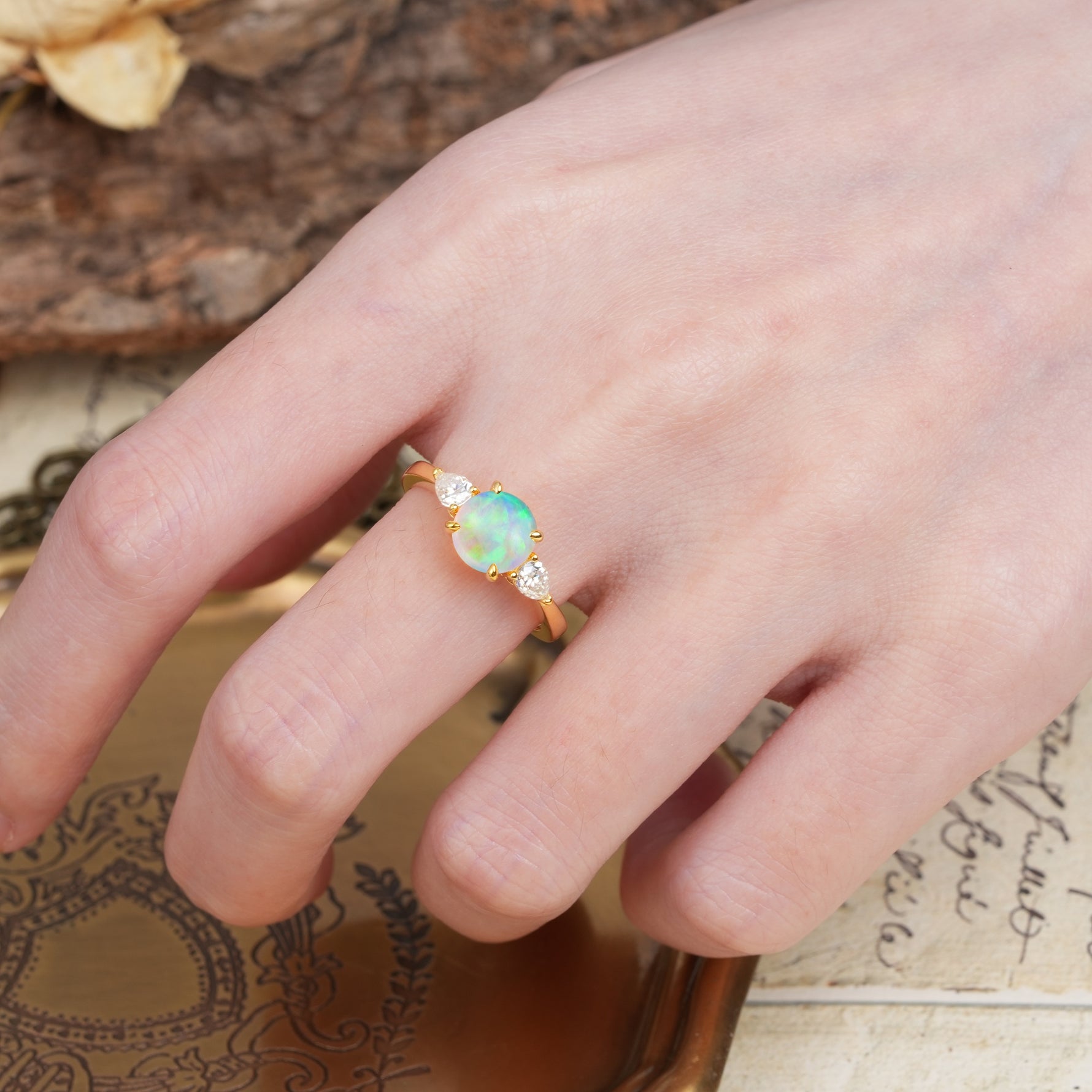 Classic, Luxurious 4-Prong Pear Cut Fire Opal Three Stone Engagement Ring - Additional view
