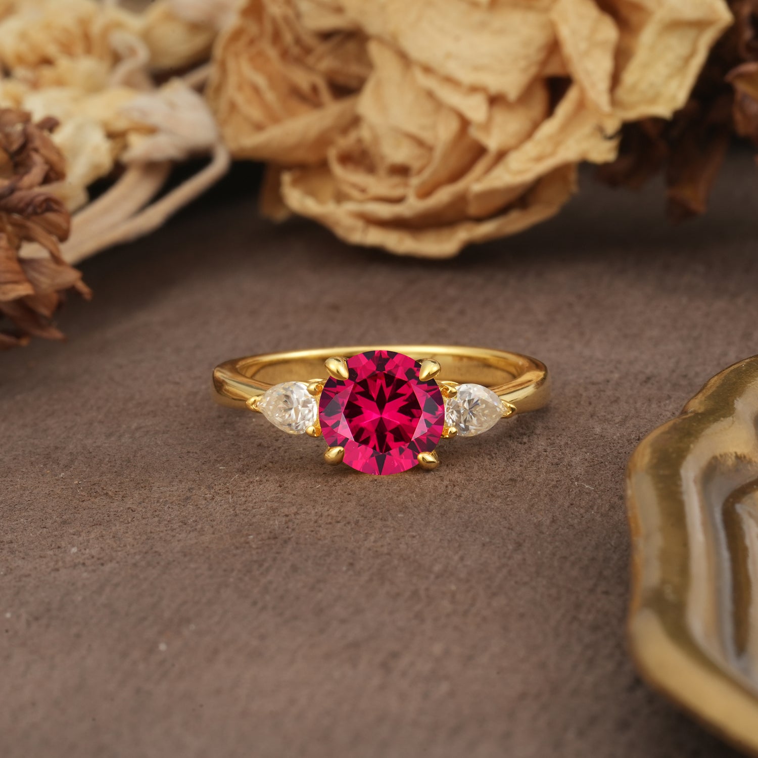 Classic, Luxurious 4-Prong Pear Cut Ruby Three Stone Engagement Ring