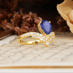 Unique Crown Three-Prong Pear Cut Tanzanite Engagement Ring - Additional view