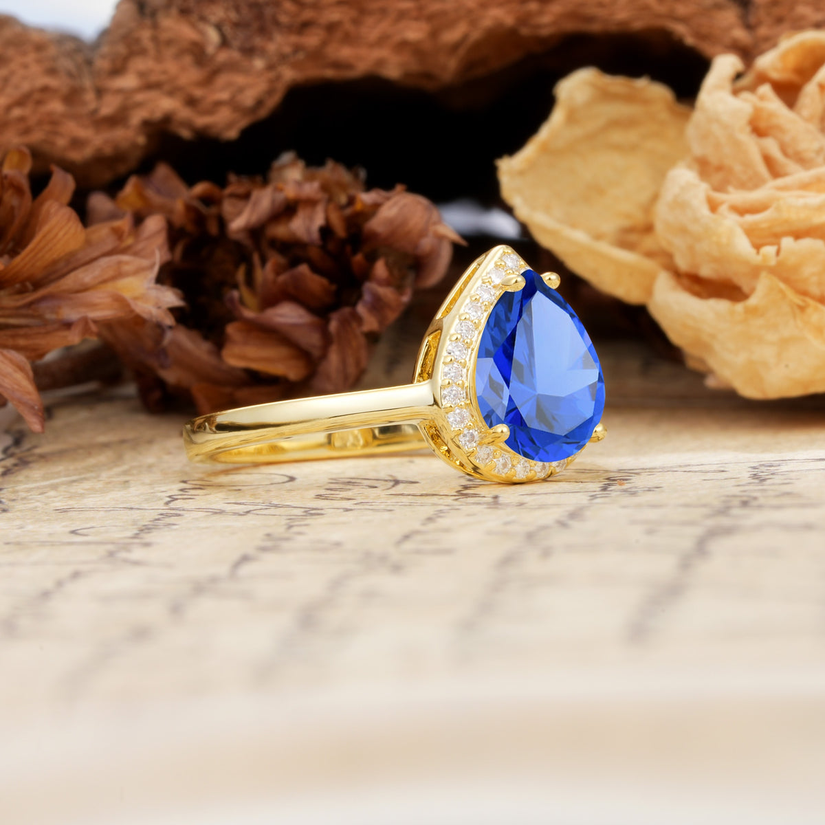 Luxurious Vintage-Style Pavé-Set, 4-Prong Pear Cut Sapphire Engagement Ring - Additional view