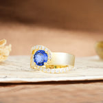 Retro-Luxe Twisted 4-Prong Round Cut Sapphire Engagement Ring - Additional view