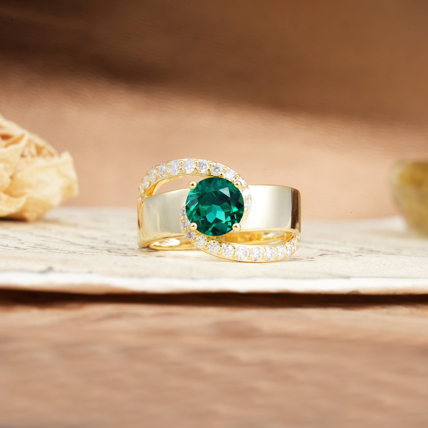 Retro-Luxe Twisted 4-Prong Round Cut Emerald Engagement Ring