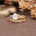 Luxurious and Unique: Entwined 4-Prong Pear Cut Moissanite Bridal Ring Set - White-Gold