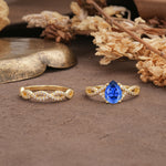 Luxurious and Unique: Entwined 4-Prong Pear Cut Sapphire Bridal Ring Set - Additional view