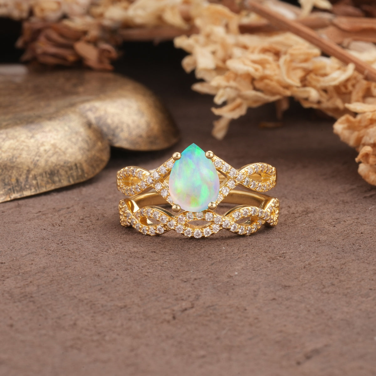 Luxurious and Unique: Entwined 4-Prong Pear Cut Fire Opal Bridal Ring Set - Yellow-Gold