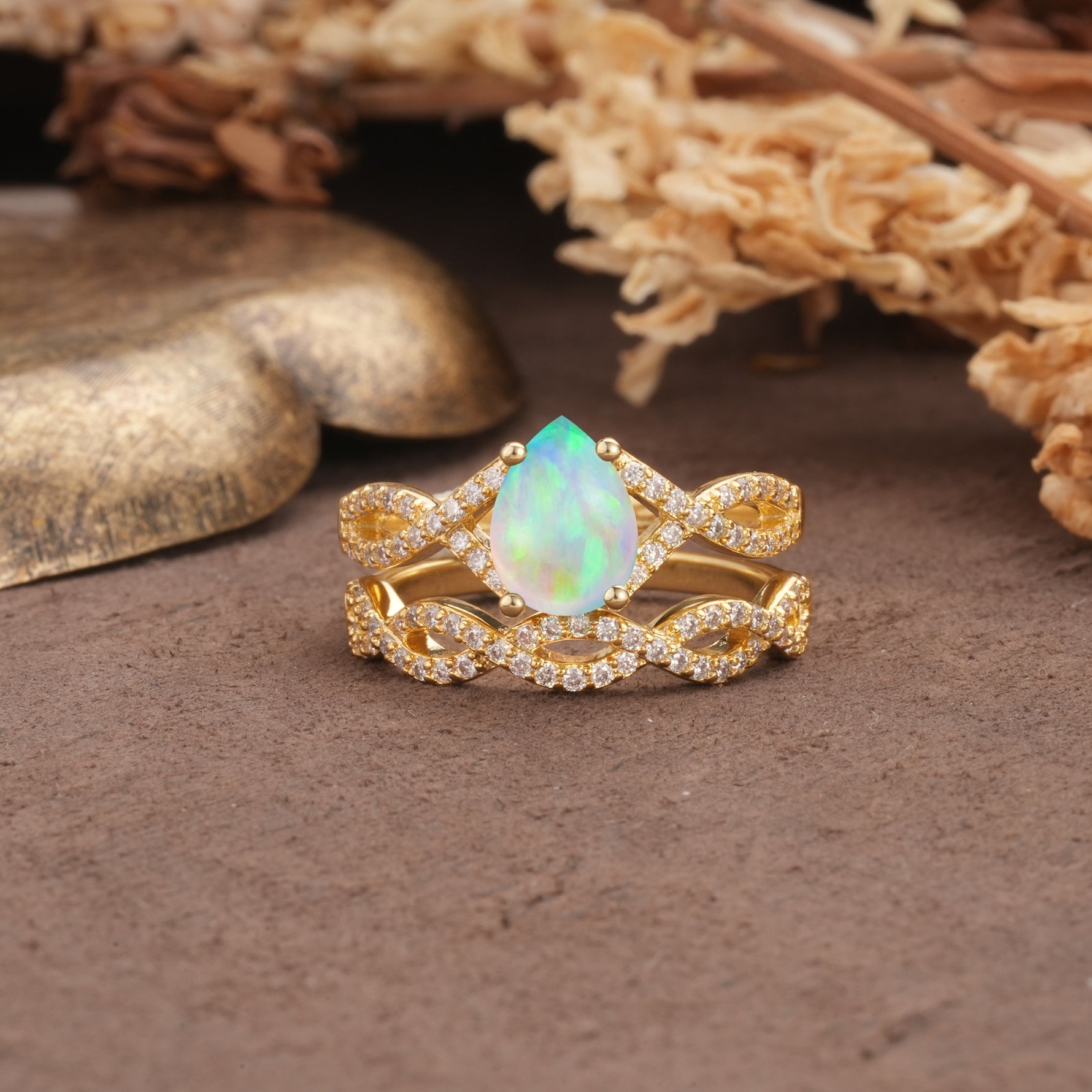 Luxurious and Unique: Entwined 4-Prong Pear Cut Fire Opal Bridal Ring Set - Yellow-Gold