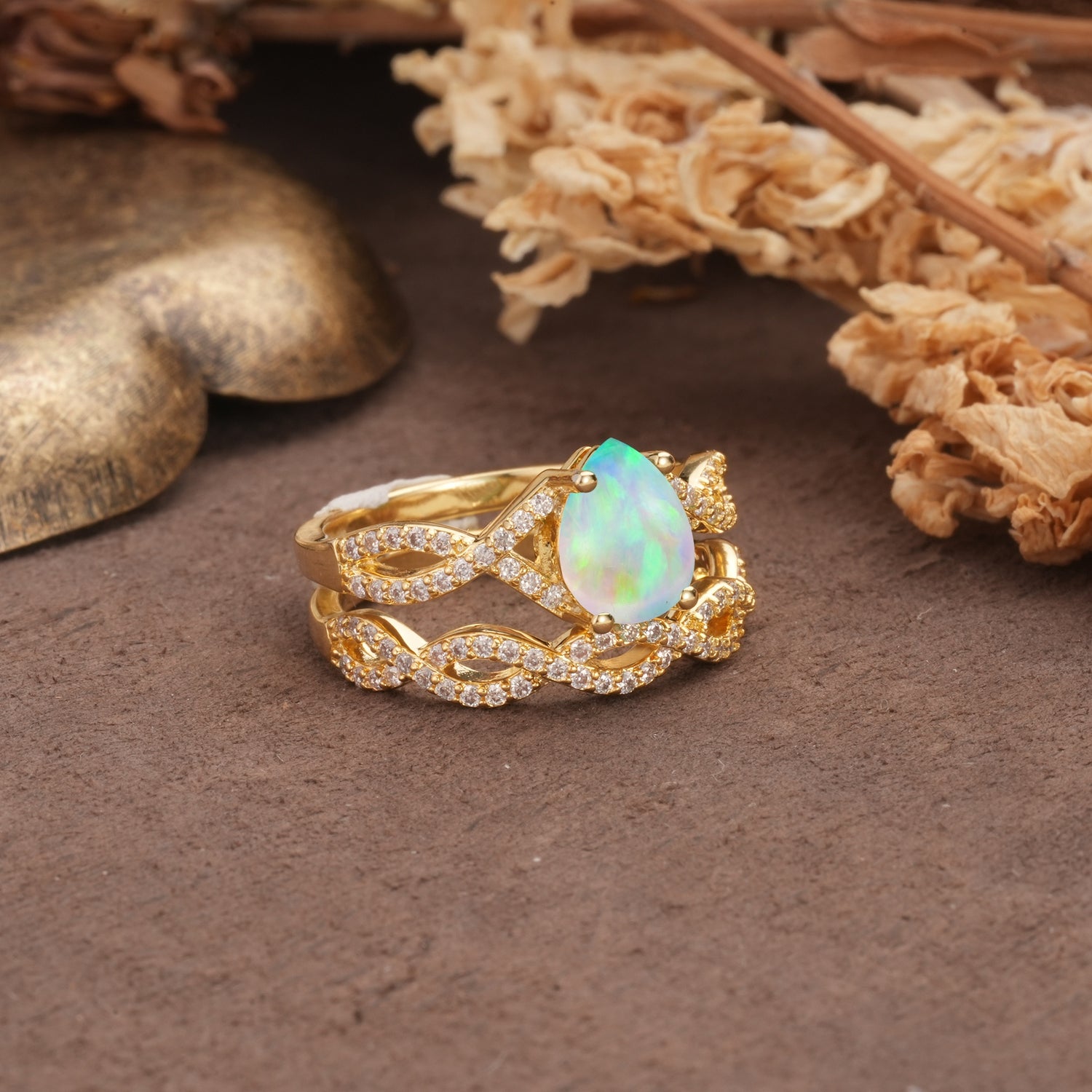 Luxurious and Unique: Entwined 4-Prong Pear Cut Fire Opal Bridal Ring Set - Rose-Gold