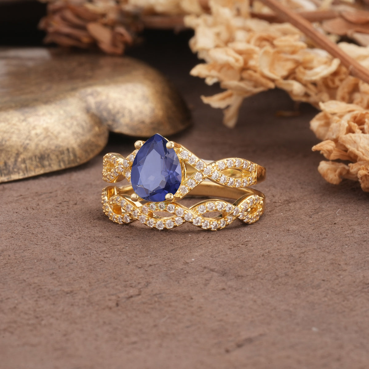 Luxurious and Unique: Entwined 4-Prong Pear Cut Tanzanite Bridal Ring Set - White-Gold