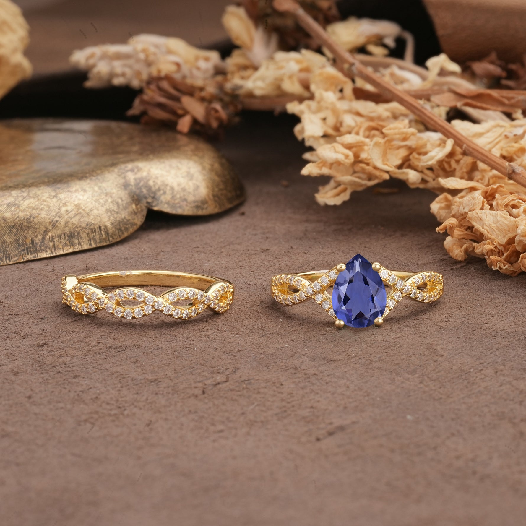 Luxurious and Unique: Entwined 4-Prong Pear Cut Tanzanite Bridal Ring Set - Additional view