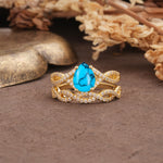 Luxurious and Unique: Entwined 4-Prong Pear Cut Turquoise Bridal Ring Set - Yellow-Gold
