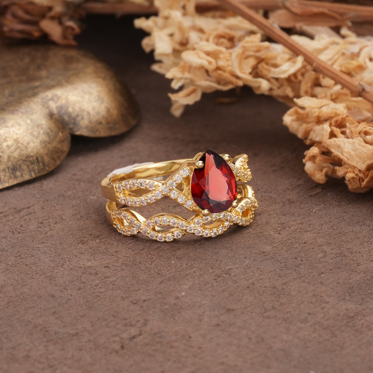 Luxurious and Unique: Entwined 4-Prong Pear Cut Garnet Bridal Ring Set - Rose-Gold