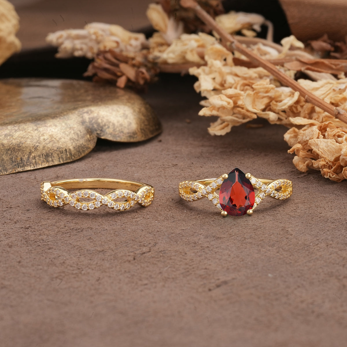 Luxurious and Unique: Entwined 4-Prong Pear Cut Garnet Bridal Ring Set - Additional view