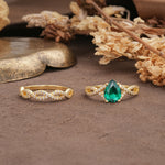 Luxurious and Unique: Entwined 4-Prong Pear Cut Emerald Bridal Ring Set - Additional view
