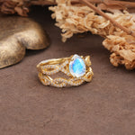 Luxurious and Unique: Entwined 4-Prong Pear Cut Moonstone Bridal Ring Set - Rose-Gold