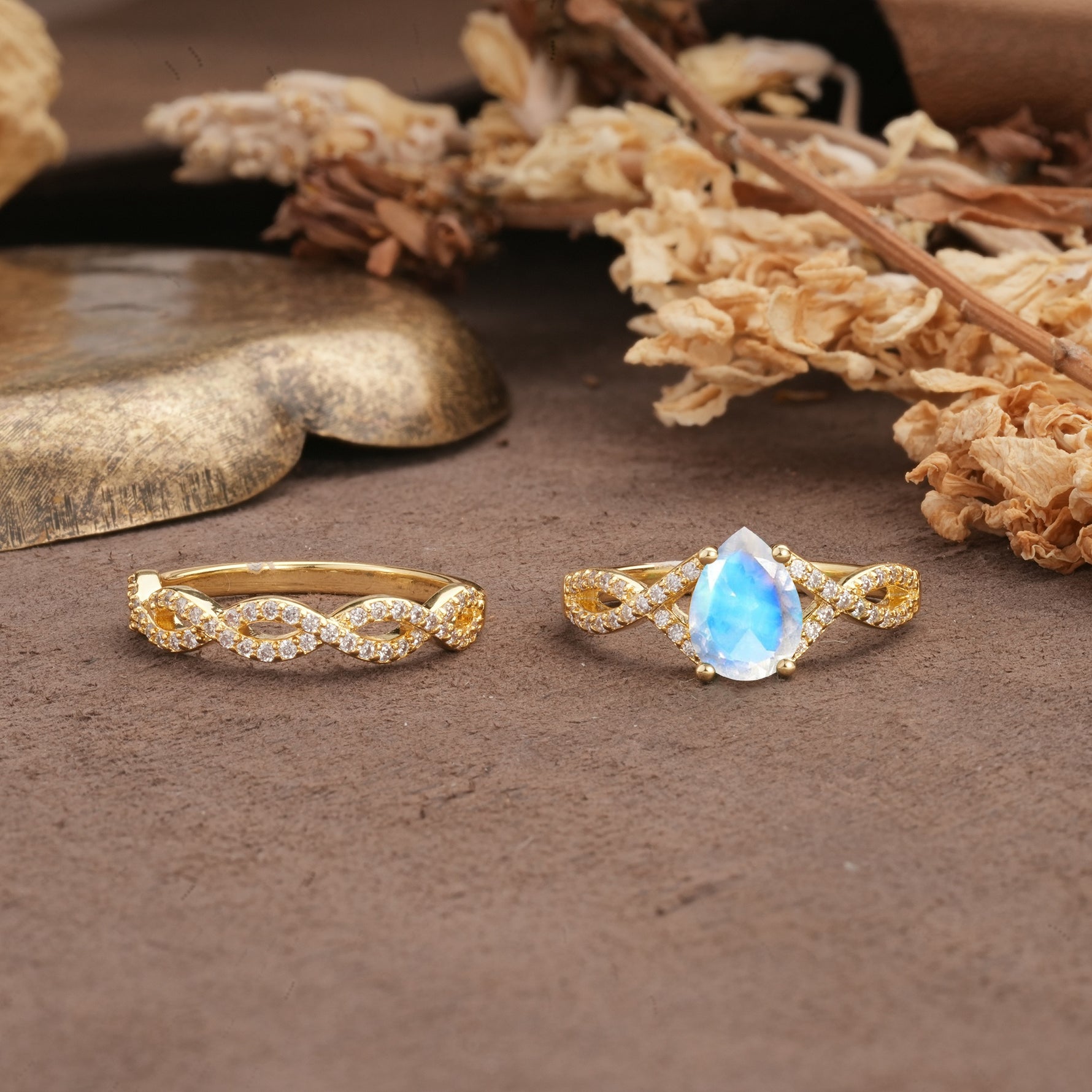 Luxurious and Unique: Entwined 4-Prong Pear Cut Moonstone Bridal Ring Set - Additional view