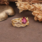 Luxurious and Unique: Entwined 4-Prong Pear Cut Ruby Bridal Ring Set - Rose-Gold