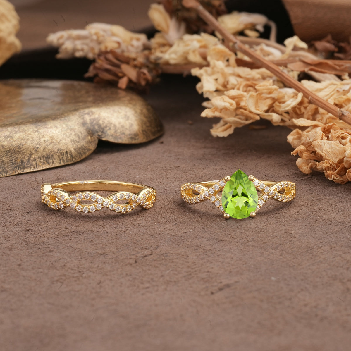 Luxurious and Unique: Entwined 4-Prong Pear Cut Peridot Bridal Ring Set - Additional view