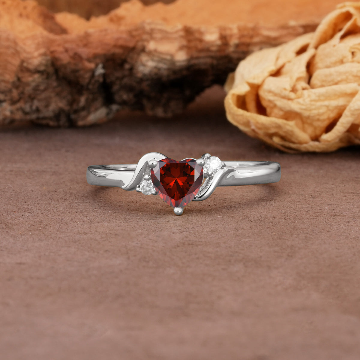 Unique Twisted 3-Prong Heart Cut Garnet Engagement Ring - Additional view