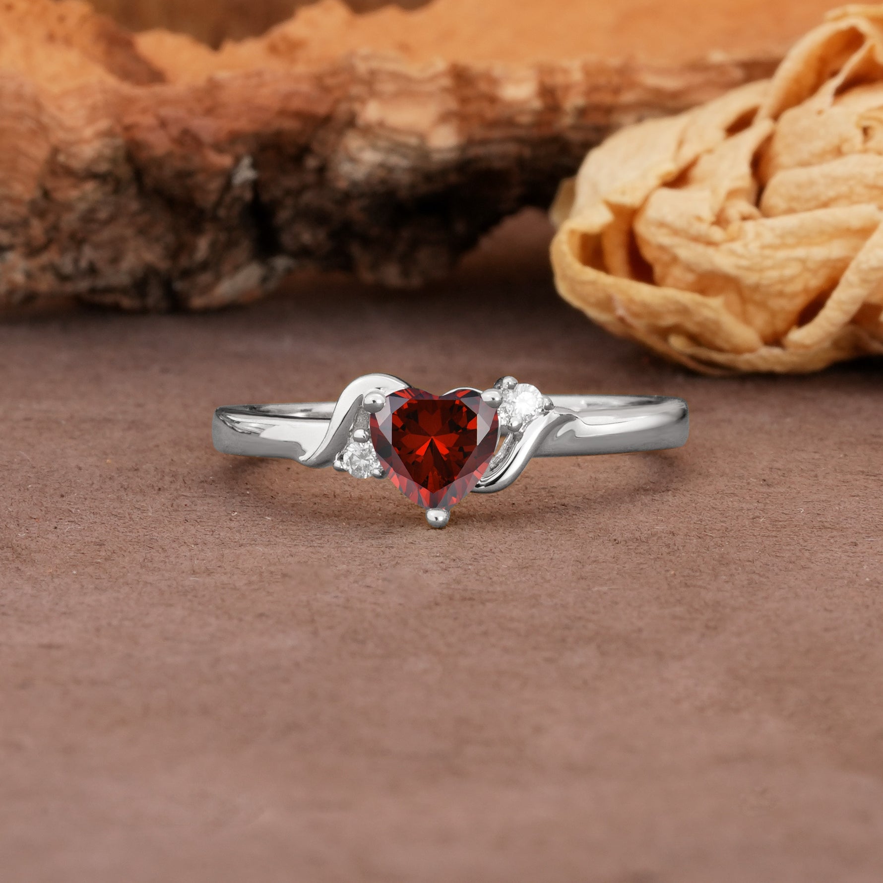 Unique Twisted 3-Prong Heart Cut Garnet Engagement Ring - Additional view