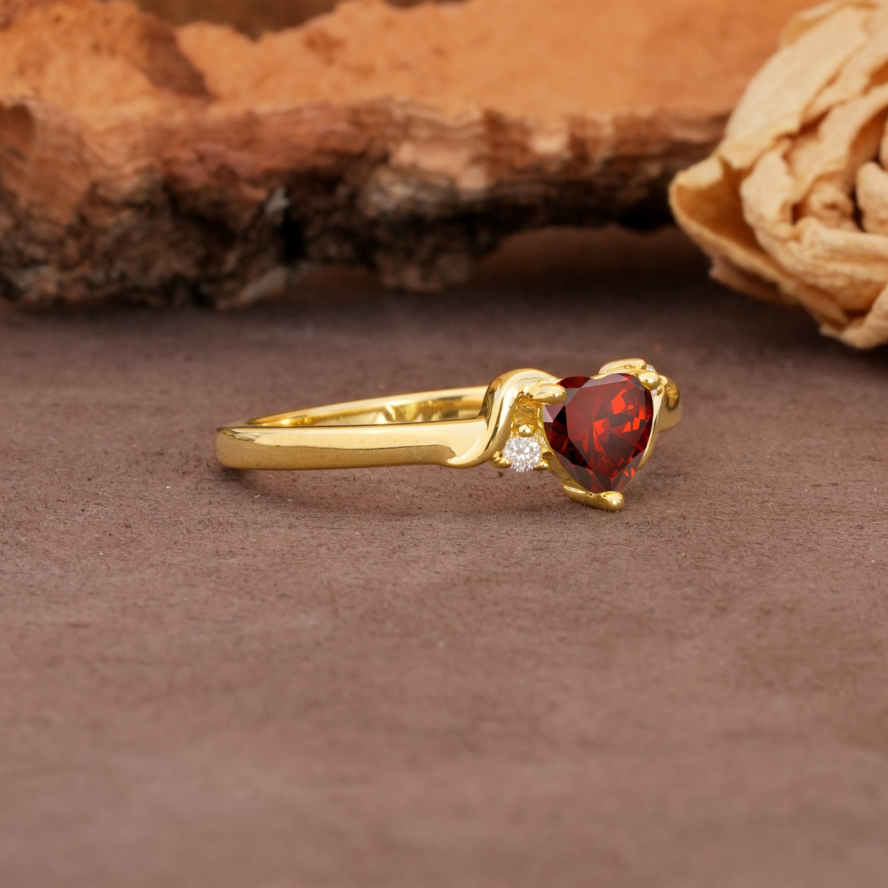 Unique Twisted 3-Prong Heart Cut Garnet Engagement Ring - Additional view