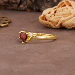 Unique Twisted 3-Prong Heart Cut Garnet Engagement Ring - Additional view