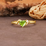 Unique Twisted 3-Prong Heart Cut Peridot Engagement Ring - Additional view