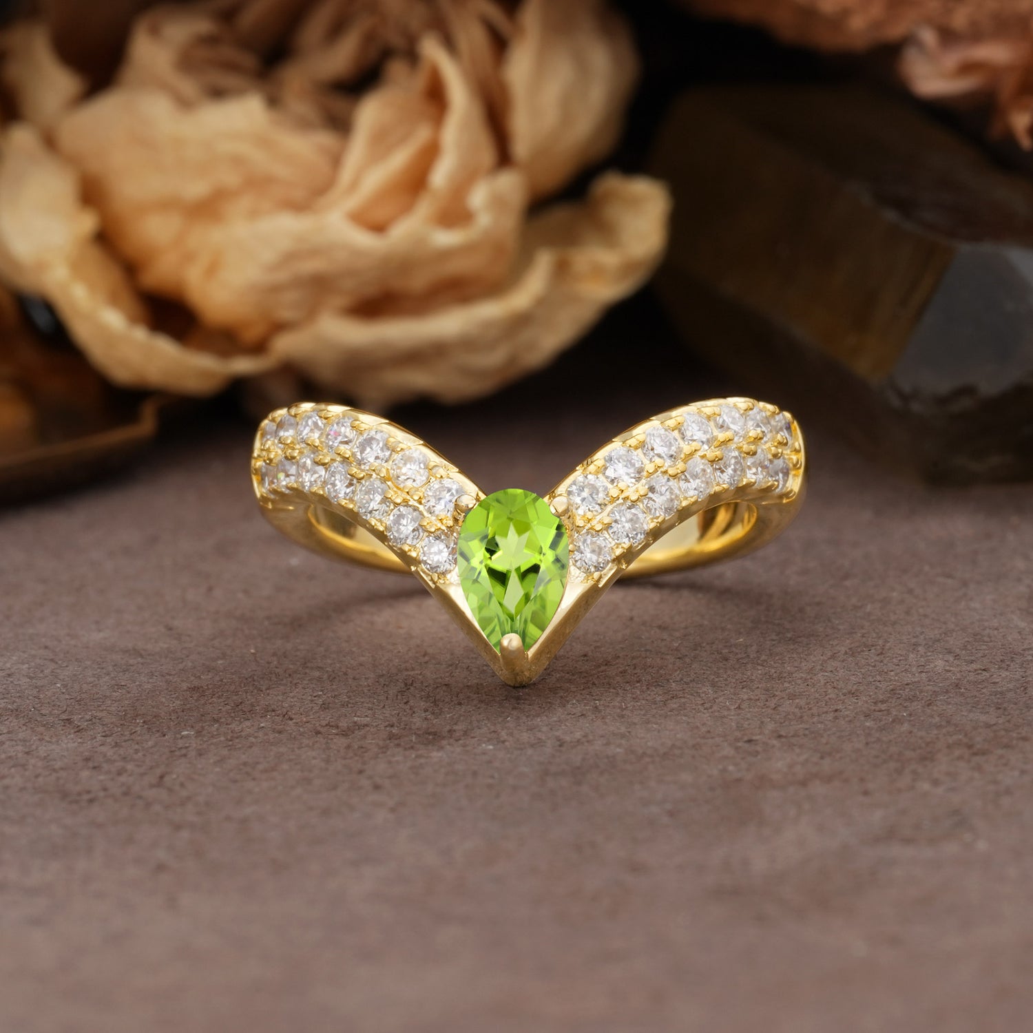 Luxurious Crown 3-Prong Pear Cut Peridot Engagement Ring