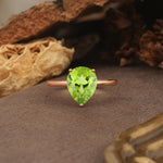 Unique, Classic, and Minimalist 3-Prong Pear Cut Peridot Engagement Ring - Additional view