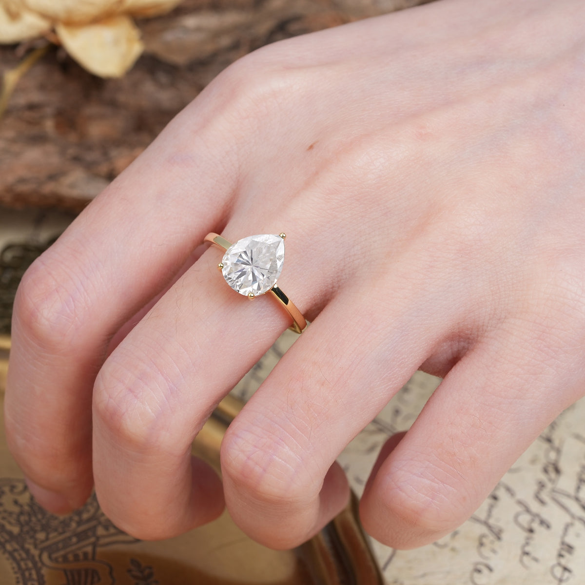Unique, Classic, and Minimalist 3-Prong Pear Cut Moissanite Engagement Ring - Additional view