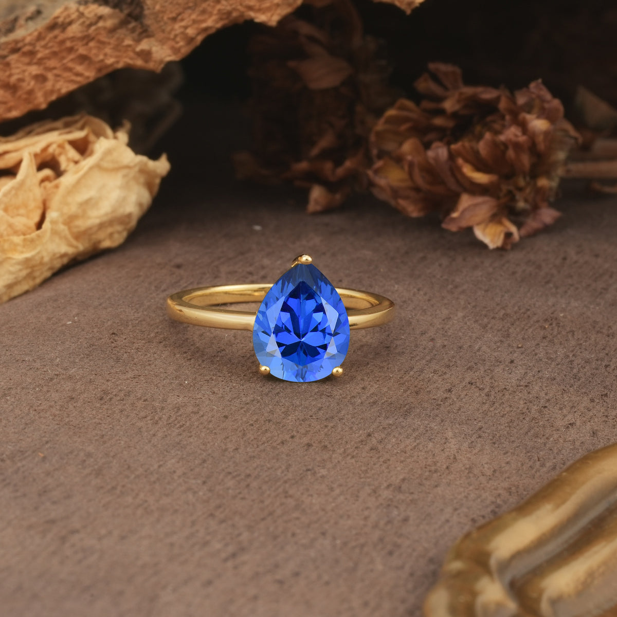 Unique, Classic, and Minimalist 3-Prong Pear Cut Sapphire Engagement Ring - Additional view