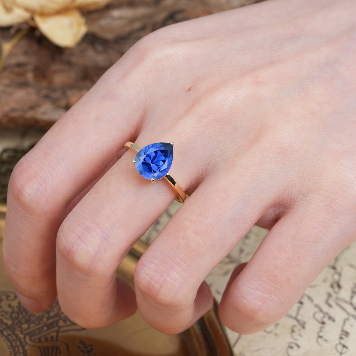 Unique, Classic, and Minimalist 3-Prong Pear Cut Sapphire Engagement Ring - Additional view