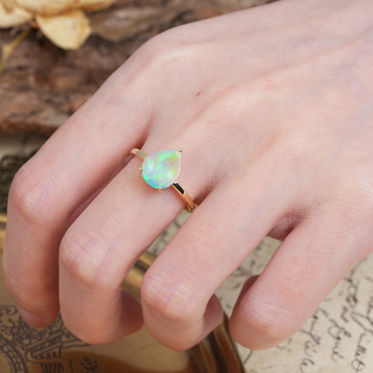 Unique, Classic, and Minimalist 3-Prong Pear Cut Fire Opal Engagement Ring - Additional view