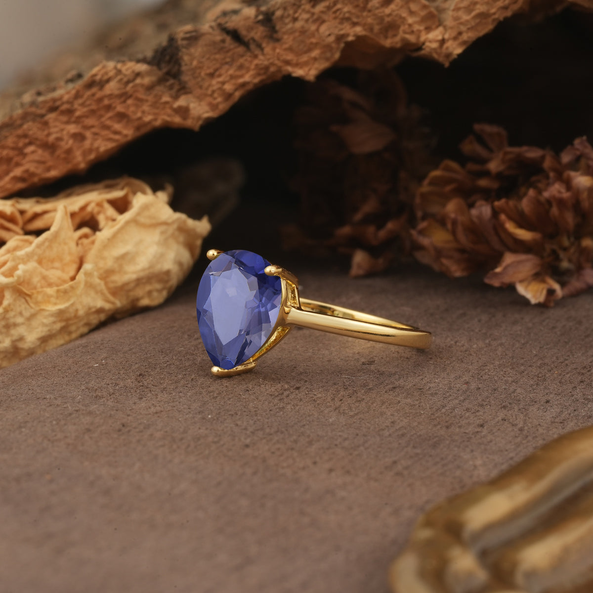 Unique, Classic, and Minimalist 3-Prong Pear Cut Tanzanite Engagement Ring - Additional view