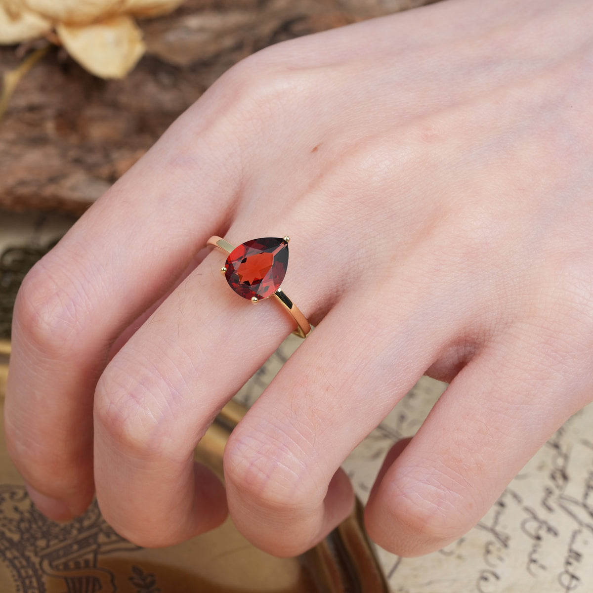 Unique, Classic, and Minimalist 3-Prong Pear Cut Garnet Engagement Ring - Additional view