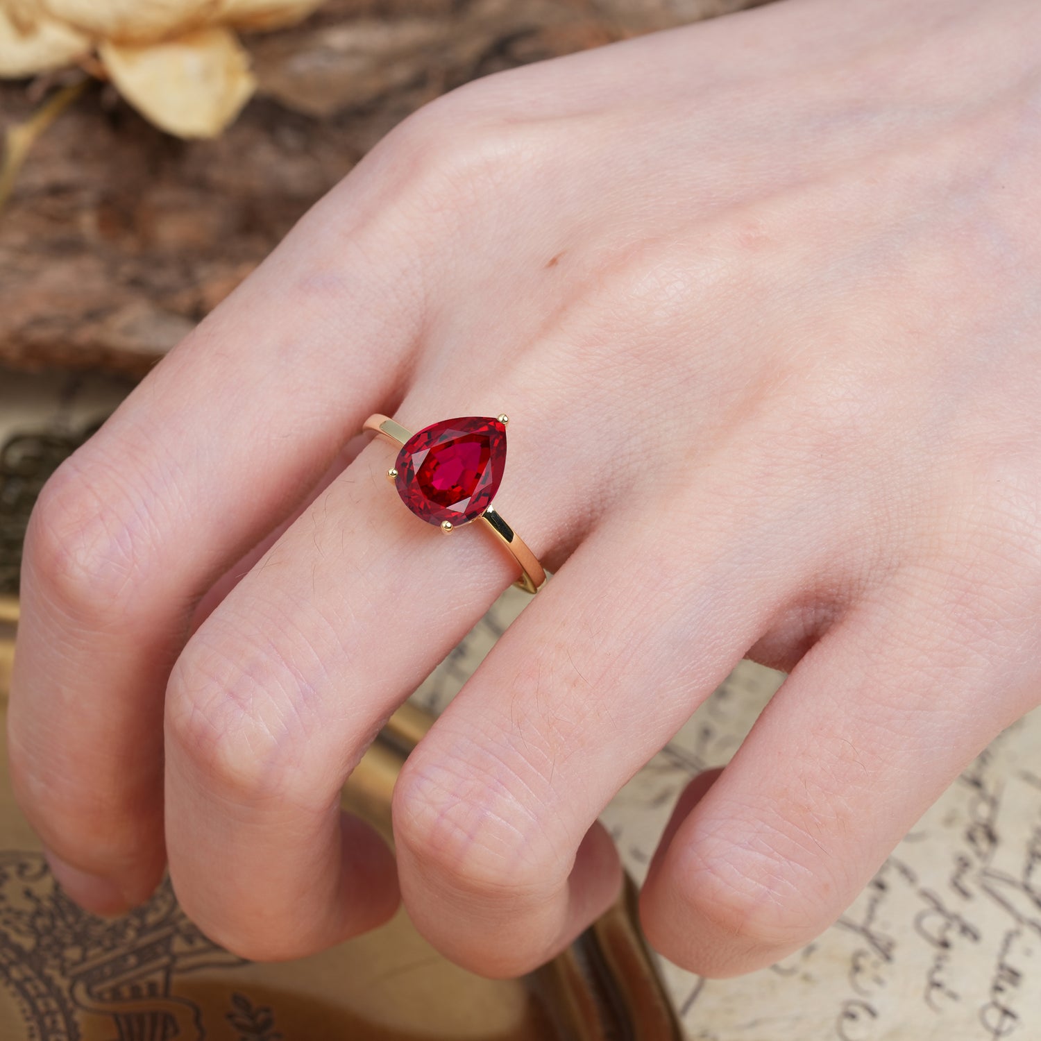 Unique, Classic, and Minimalist 3-Prong Pear Cut Ruby Engagement Ring