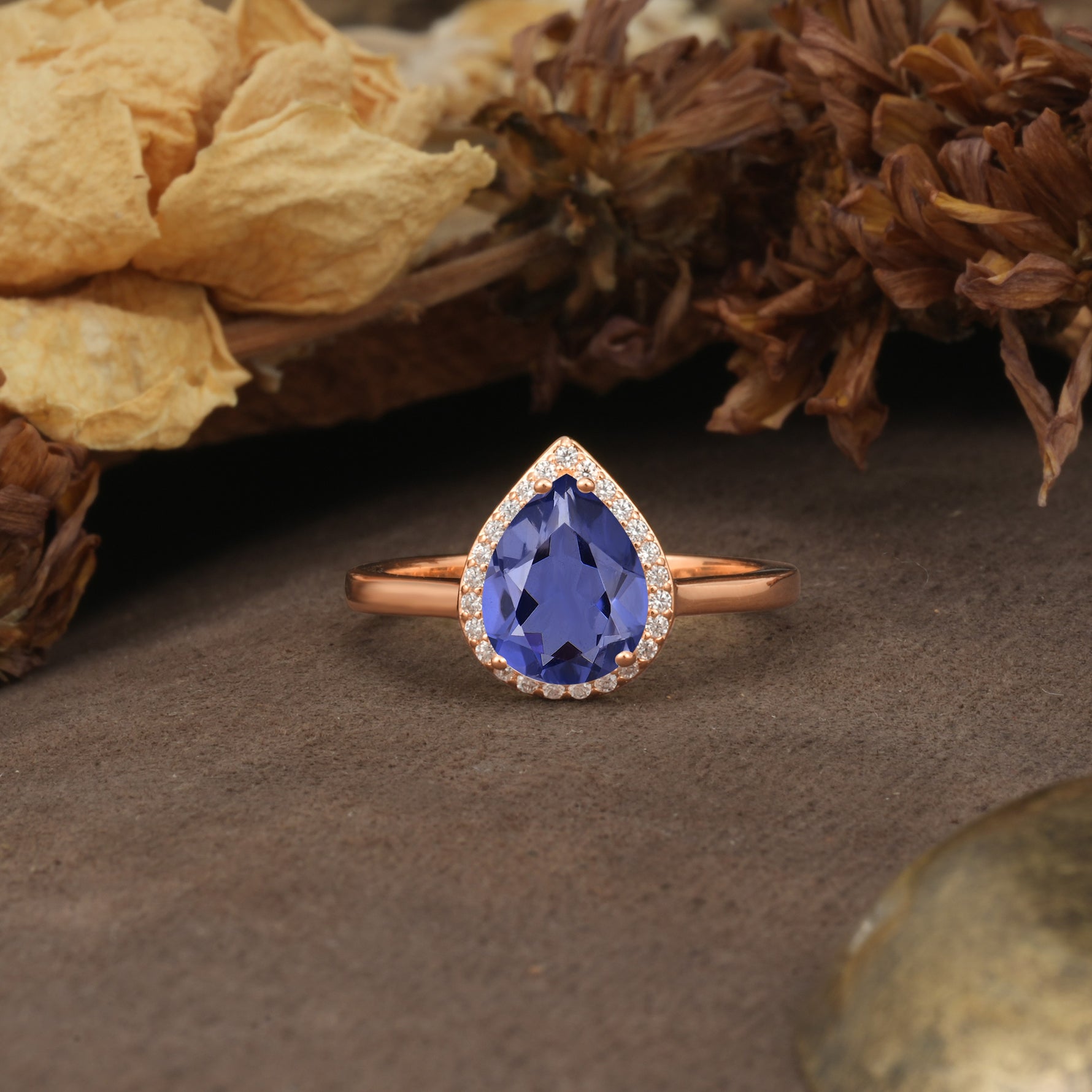 Luxurious and Unique 4-Prong Pear Cut Tanzanite Engagement Ring - Additional view