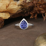 Luxurious and Unique 4-Prong Pear Cut Tanzanite Engagement Ring - Additional view
