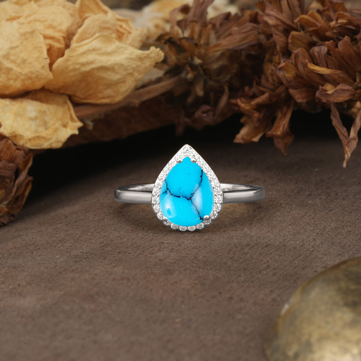 Luxurious and Unique 4-Prong Pear Cut Turquoise Engagement Ring - Additional view
