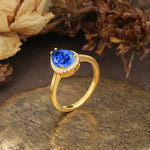 Luxurious and Unique 4-Prong Pear Cut Sapphire Engagement Ring - Additional view