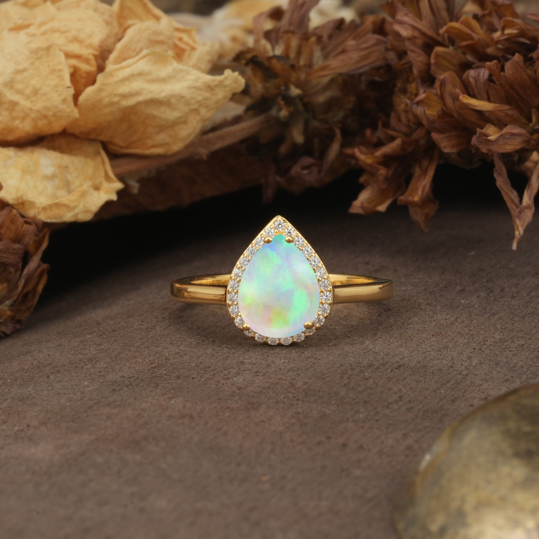 Luxurious and Unique 4-Prong Pear Cut Fire Opal Engagement Ring - Additional view