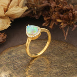 Luxurious and Unique 4-Prong Pear Cut Fire Opal Engagement Ring - Additional view
