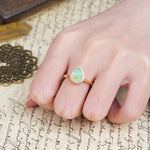 Luxurious and Unique 4-Prong Pear Cut Fire Opal Engagement Ring - Additional view