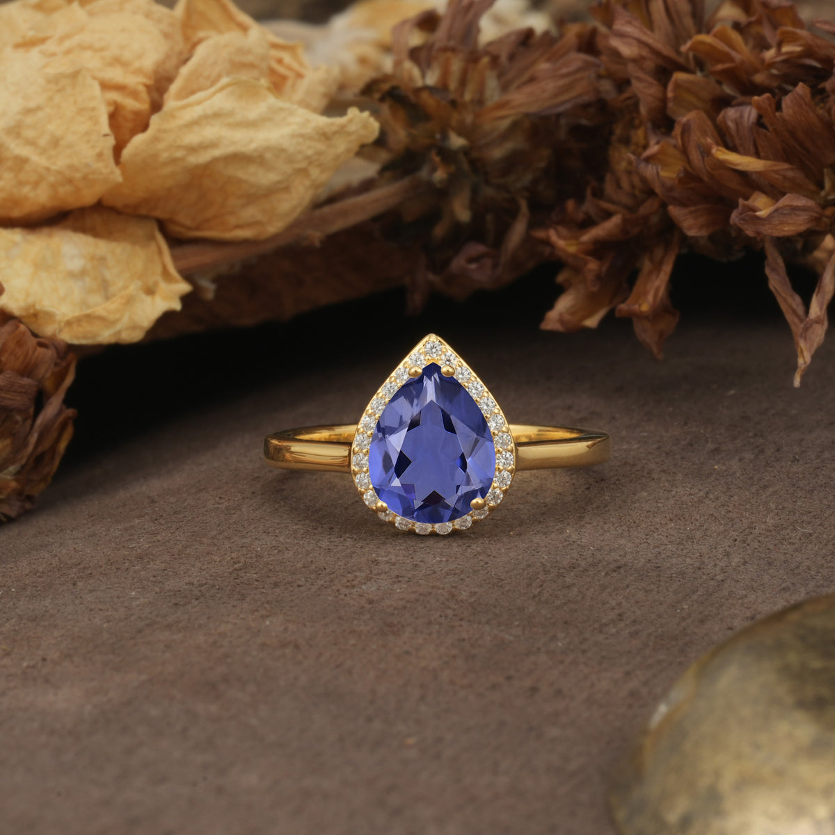 Luxurious and Unique 4-Prong Pear Cut Tanzanite Engagement Ring - Additional view