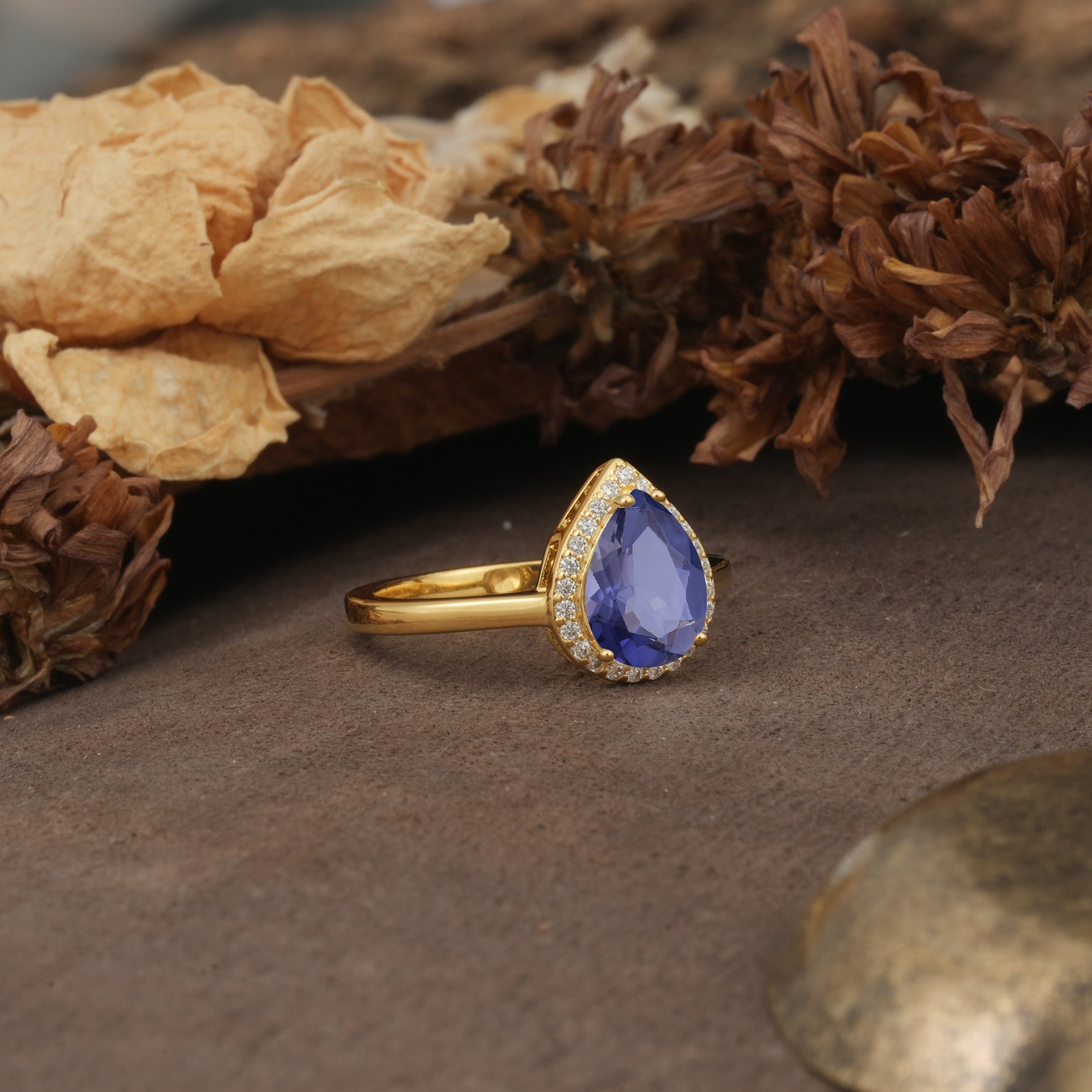 Luxurious and Unique 4-Prong Pear Cut Tanzanite Engagement Ring - Additional view