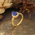 Luxurious and Unique 4-Prong Pear Cut Tanzanite Engagement Ring - Additional view